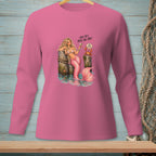 Pink long sleeve shirt with a mermaid, crab, and text: "And yet, here you are."