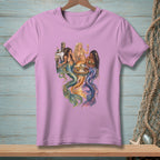 Three mermaids with colorful tails sit on a dock, drinking cocktails.