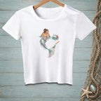 White t-shirt with a watercolor graphic of a mermaid reaching for a drink.