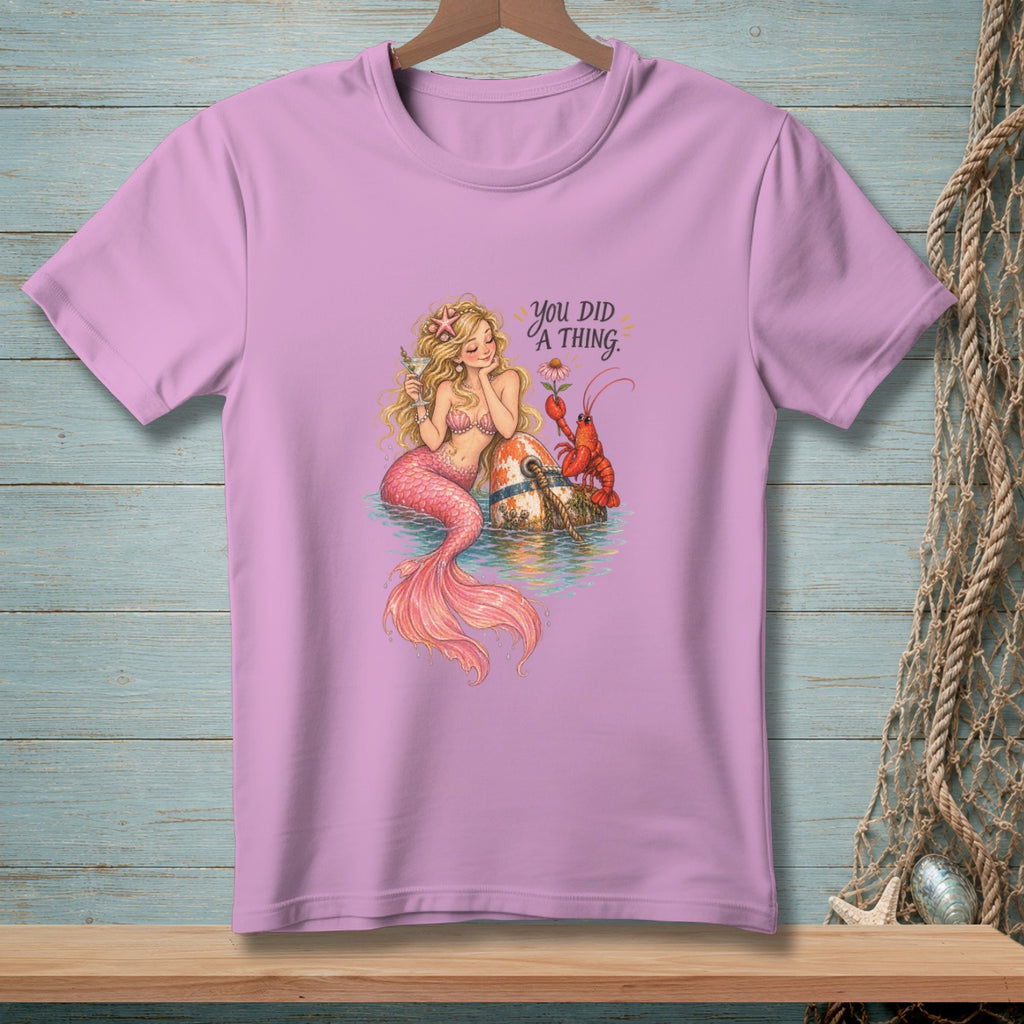 Pink t-shirt with a mermaid, lobster, and the text "you DID A THING".