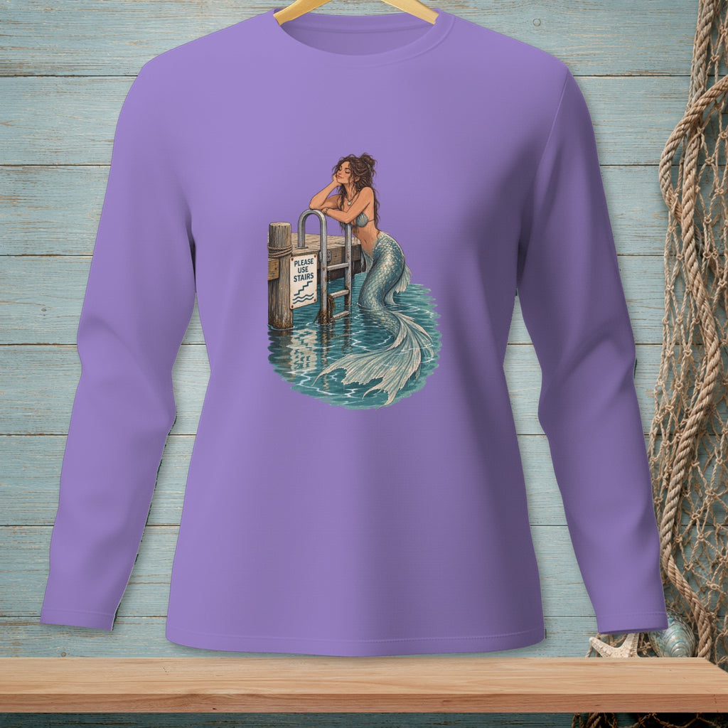 Mermaid resting on dock with "Please Use Stairs" sign and detailed tail.