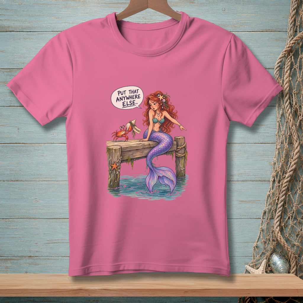 Pink t-shirt with cartoon mermaid and crab on a dock, text bubble says "Put that anywhere else."