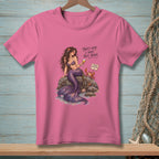 Pink t-shirt with illustration of a mermaid, crab, and text "That's why I have nice things."