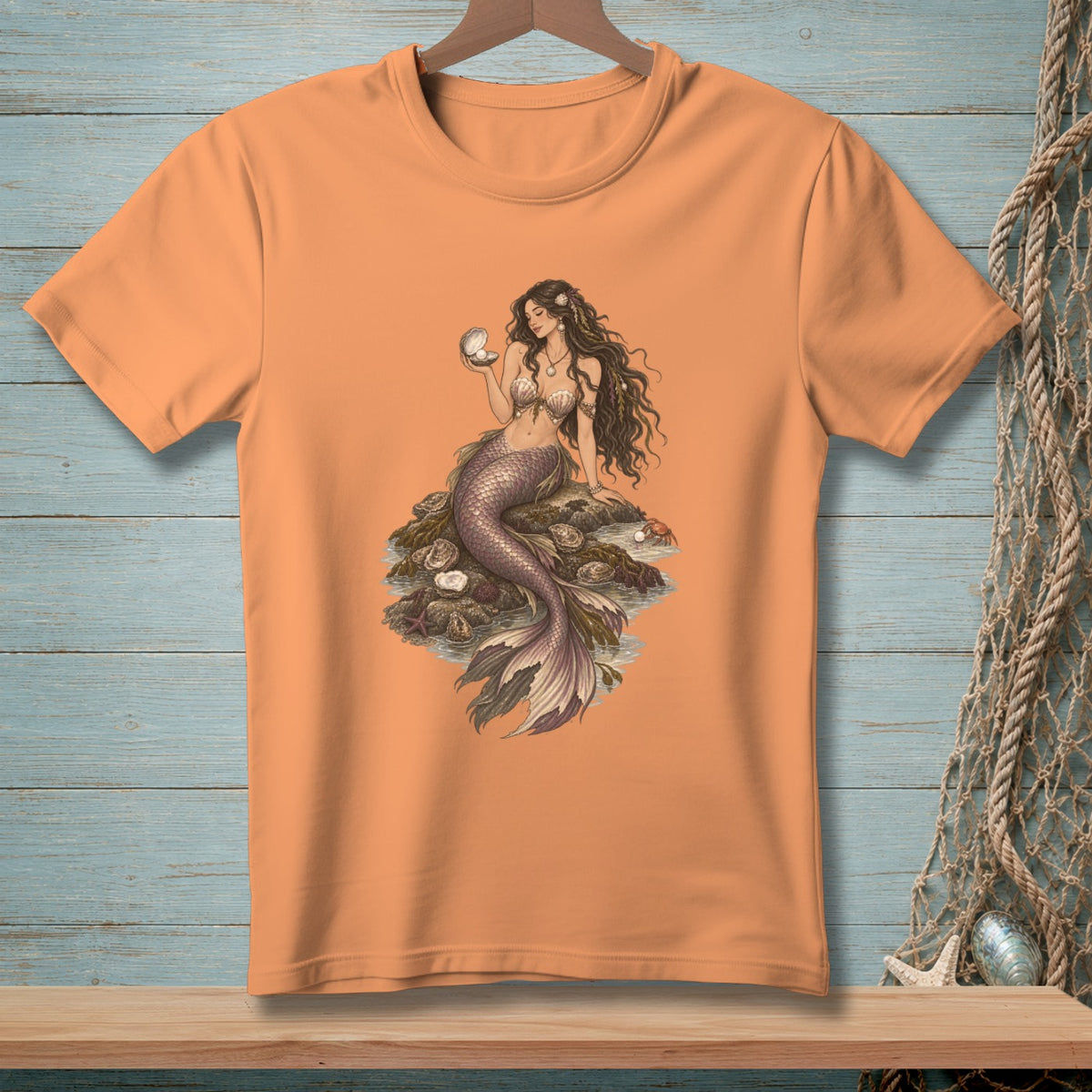 Mermaid with pearl sitting on rocks surrounded by shells and starfish.