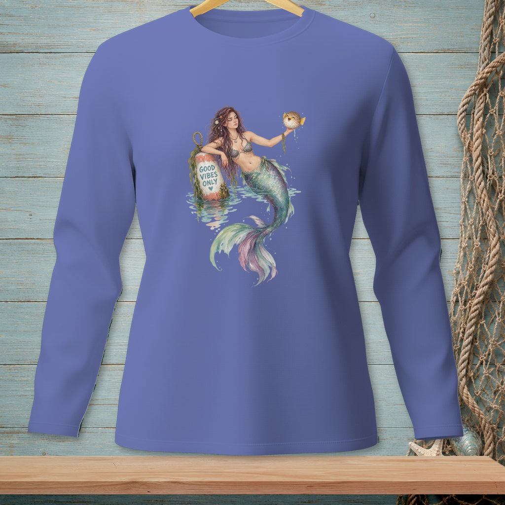 Mermaid holding pufferfish next to "Good Vibes Only" buoy.