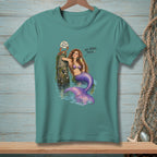 Mermaid with purple tail drinks champagne next to a pier post with a crab.