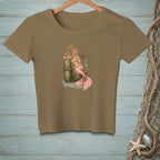 Brown t-shirt with a blonde mermaid illustration and the text "Indoor Voice."