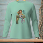 Mermaid sitting on dock pouring wine with crab and text.