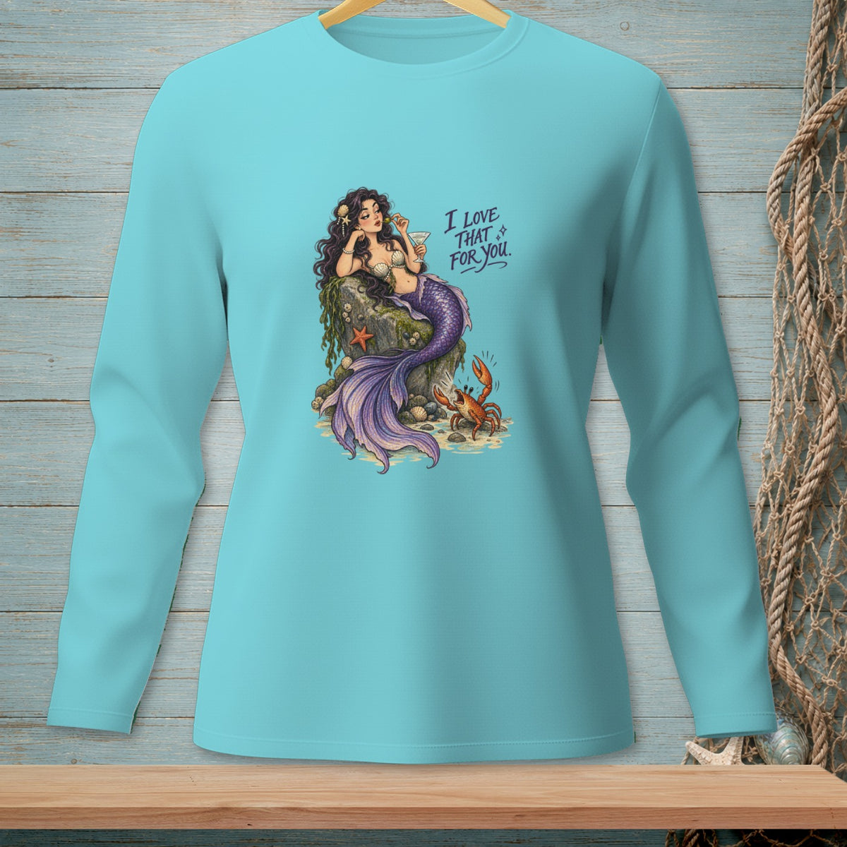 Mermaid on a rock with a crab, text "I love that for you."