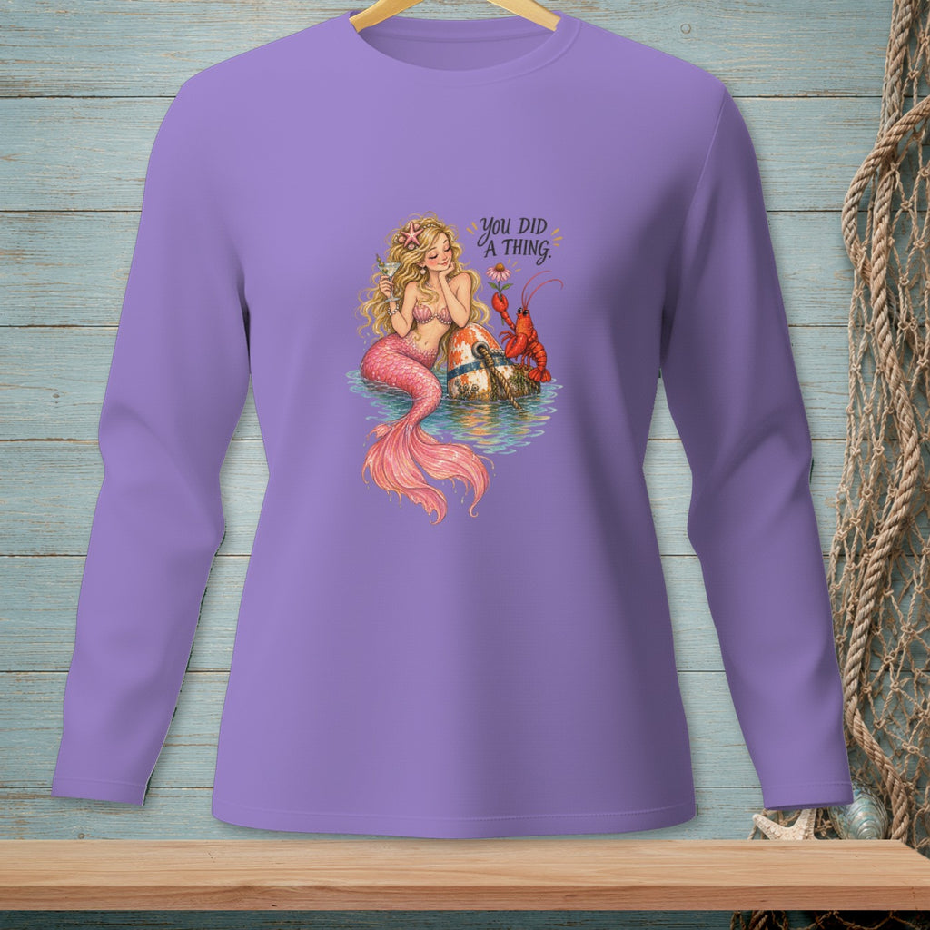 Mermaid with lobster and text "You Did A Thing." on purple long sleeve shirt.