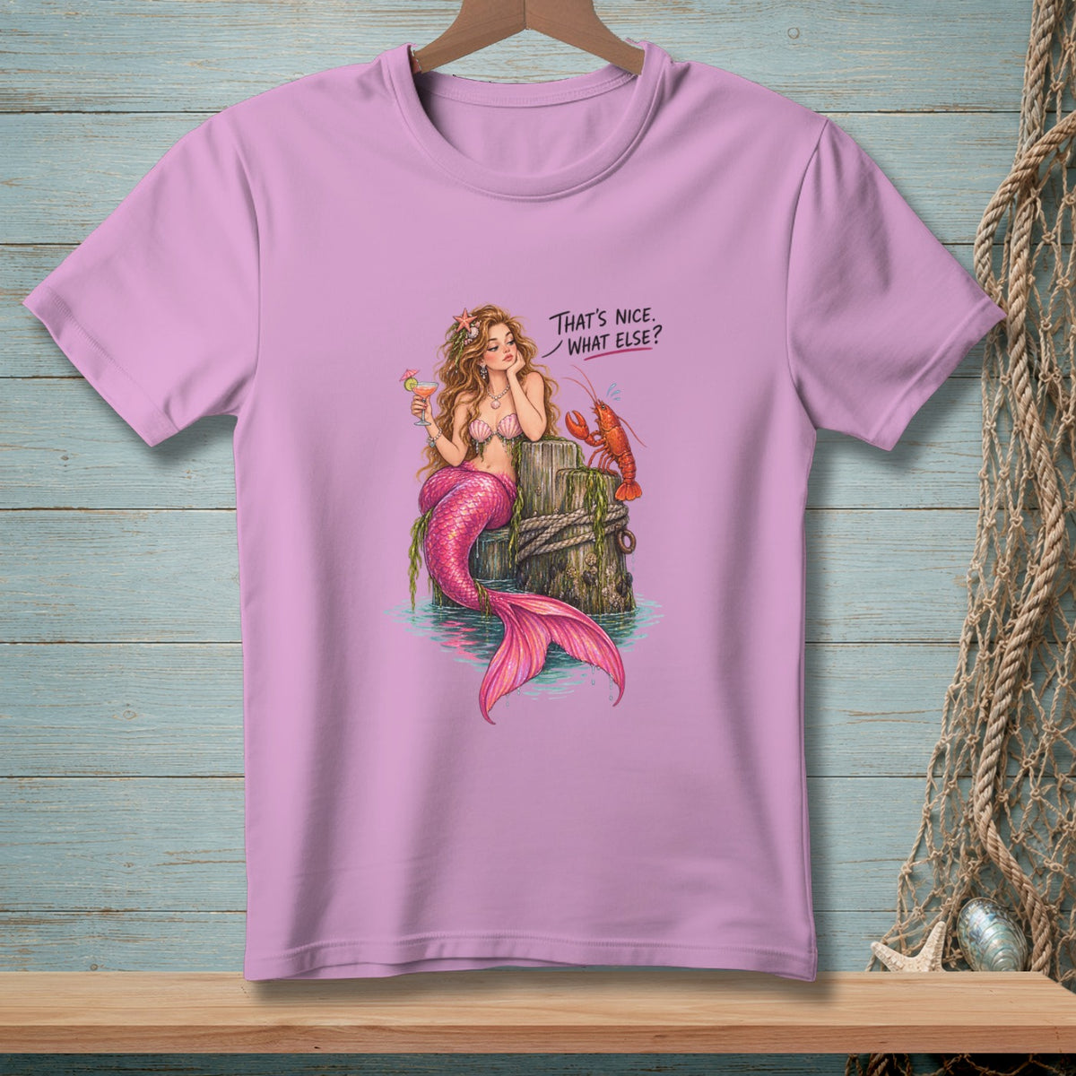 Mermaid with pink tail holding drink and lobster, text "That's nice. What else?".