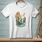 Illustration of a blonde mermaid holding a cocktail near a crab and a wooden post.