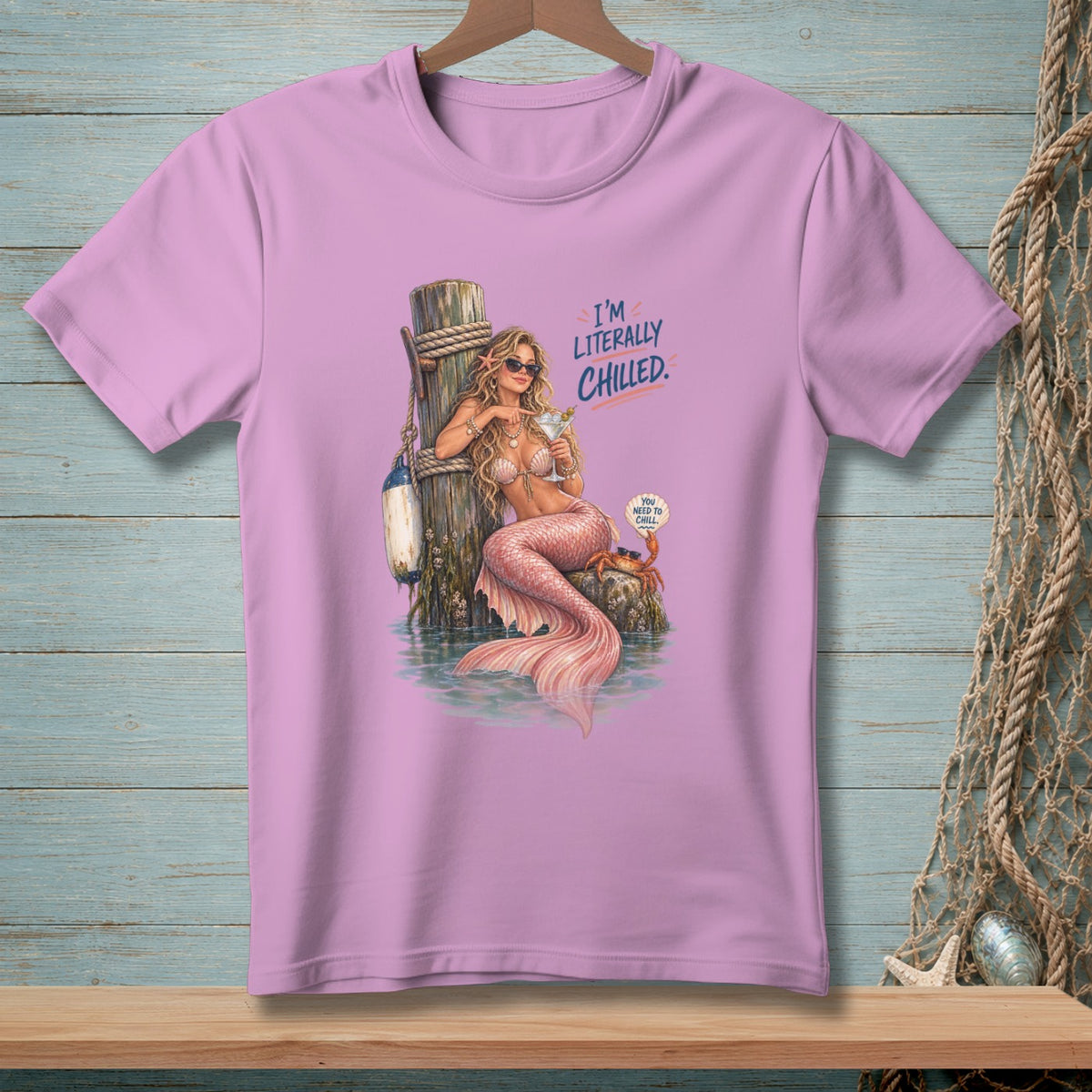 Mermaid with pink tail drinks martini, saying "I'm Literally Chilled."