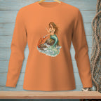 Orange long sleeve shirt with a mermaid holding pearls next to a lobster.