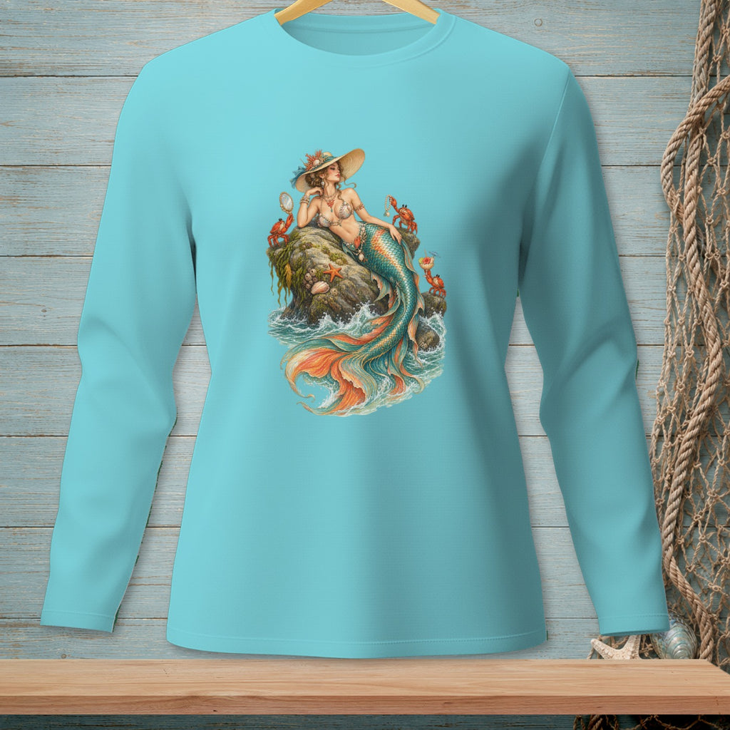 Long-sleeve teal shirt with mermaid graphic on rock, crabs, and sea.