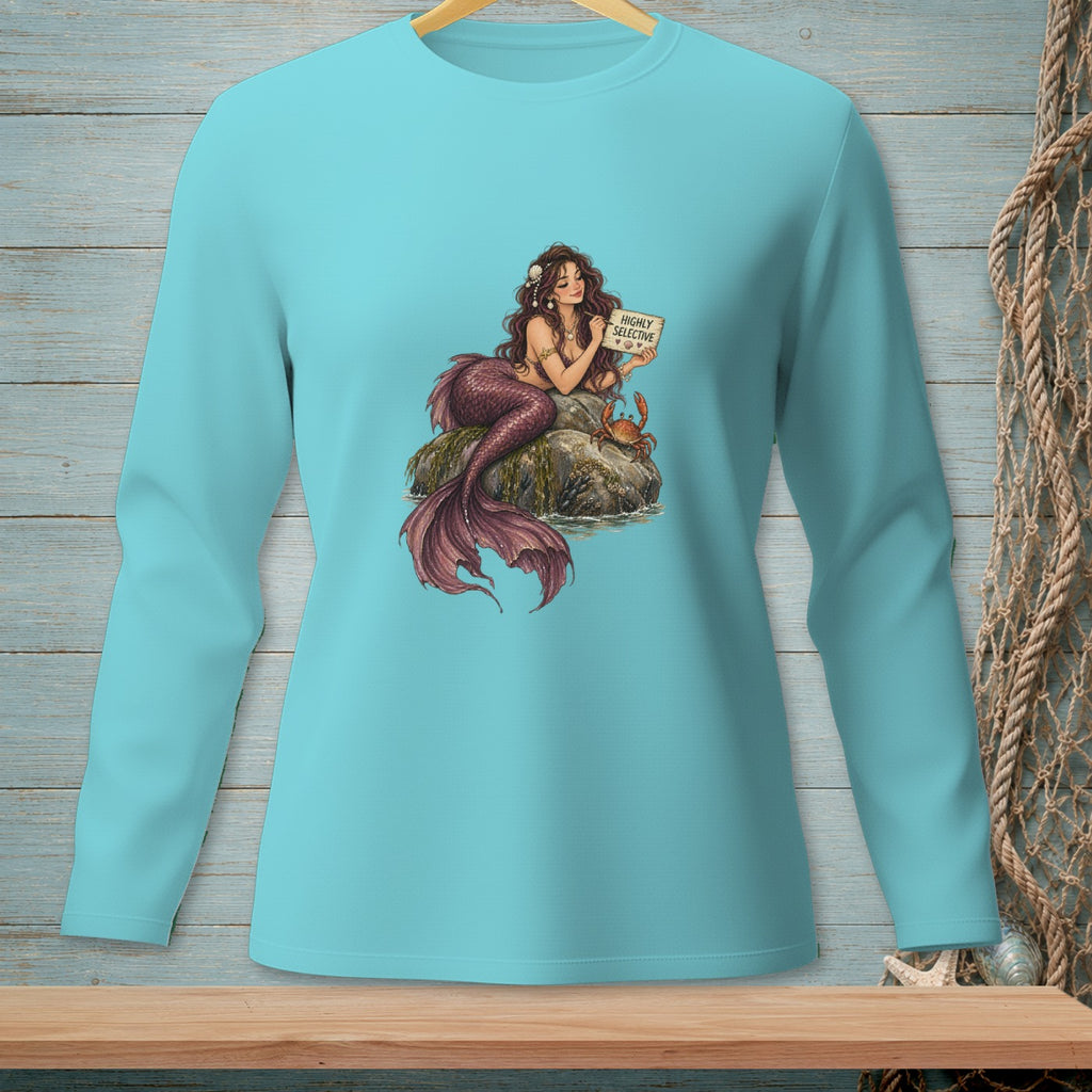 Mermaid holding sign "Highly Selective" with crab and seashells.