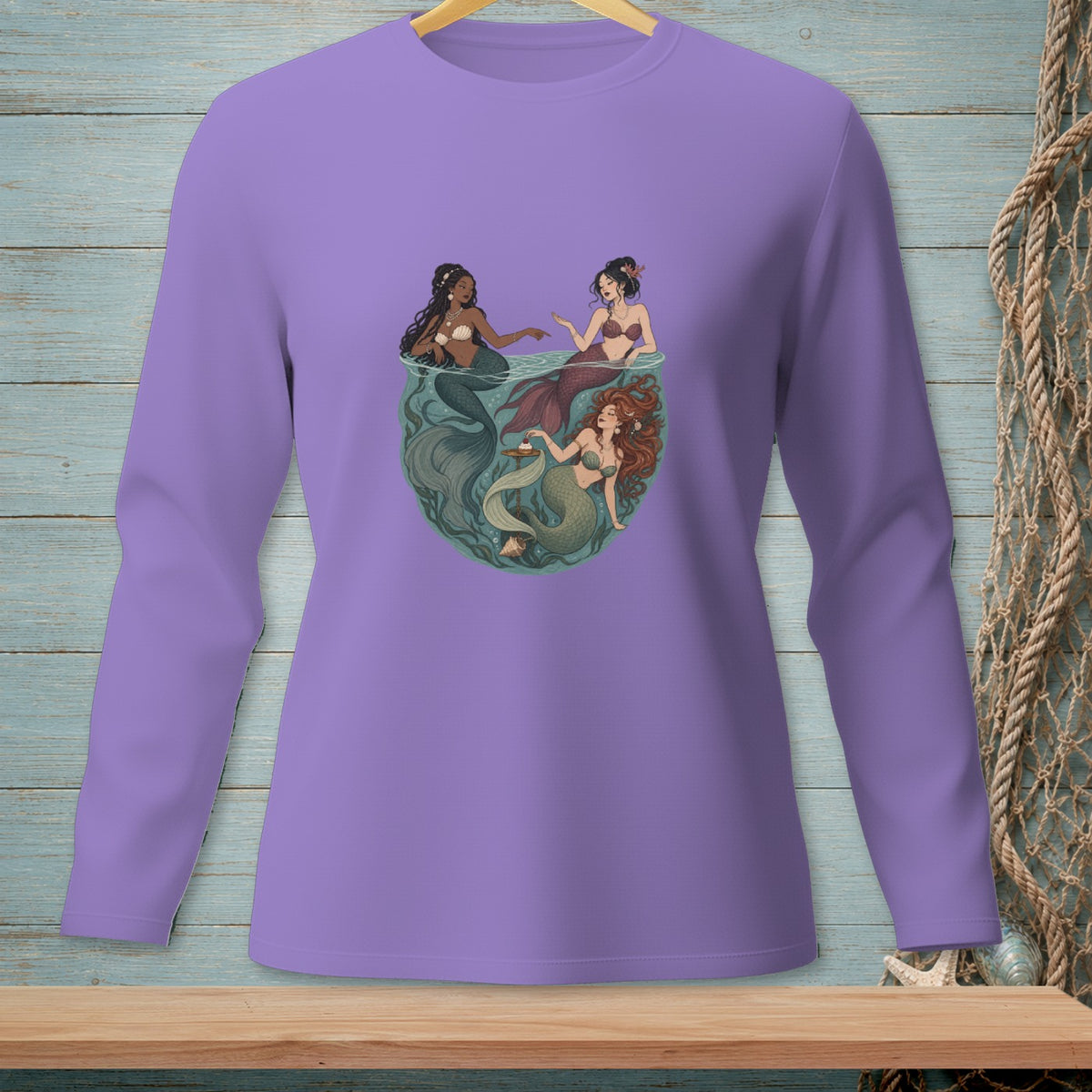 Three mermaids interact in a circular, underwater scene.