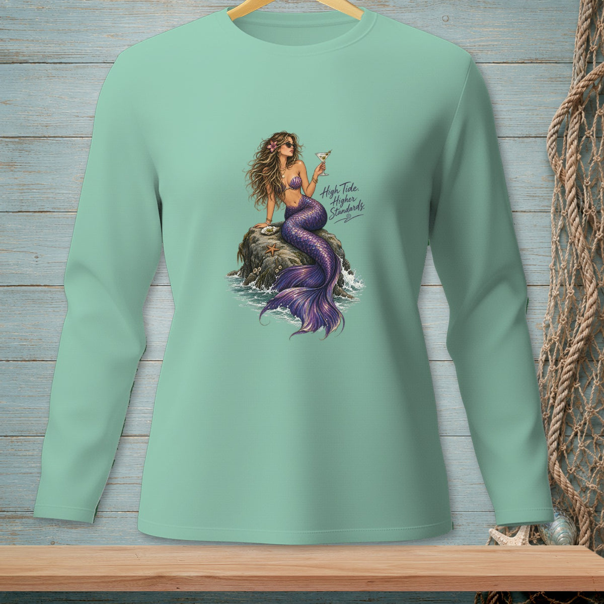 Mermaid with purple tail holding cocktail, text "High Tide. Higher Standards."