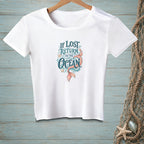 White t-shirt with "If Lost Return to the Ocean" and mermaid tail graphic.