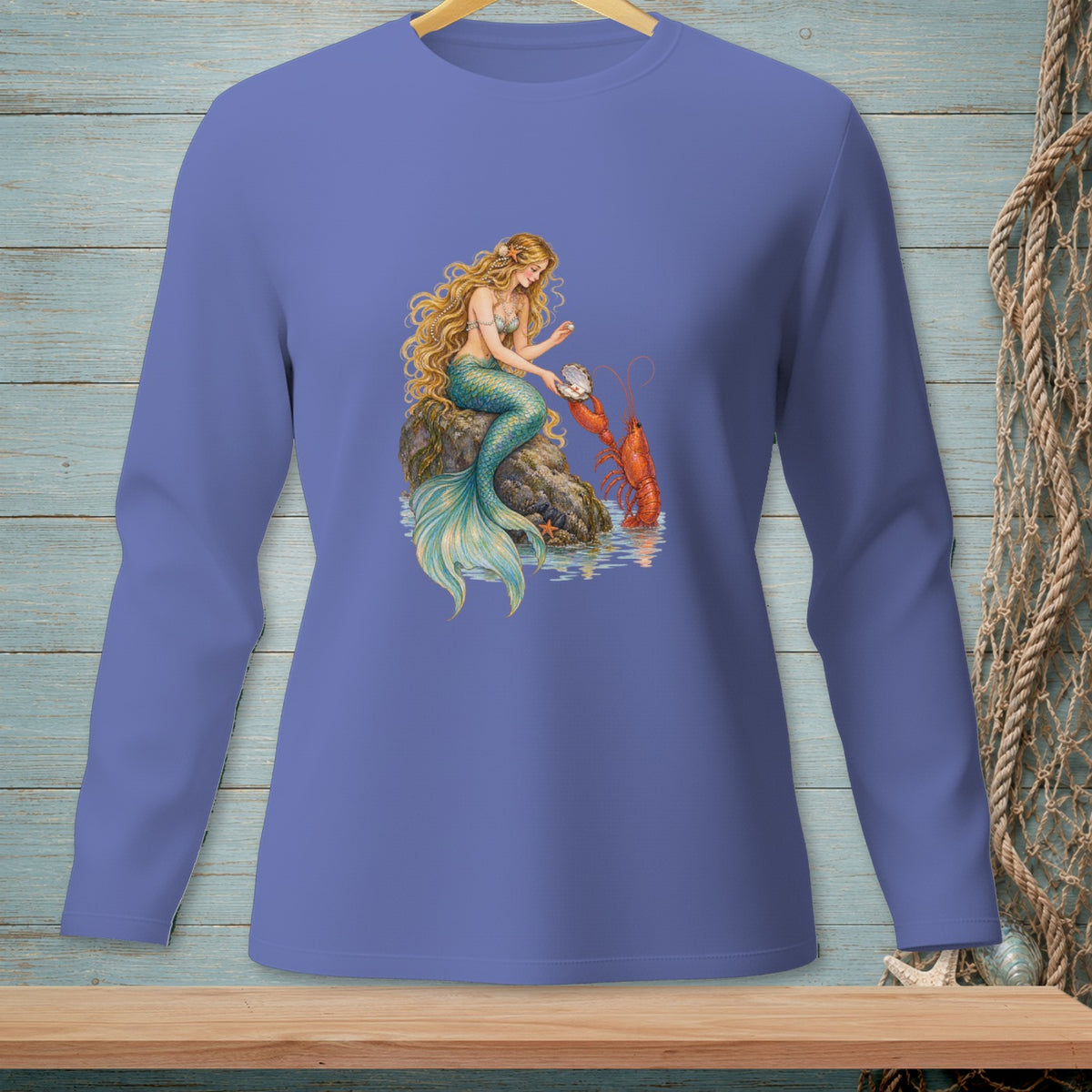 Mermaid holding seashell with lobster beside her on a rock by the water.