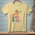 Yellow t-shirt with a mermaid, lobster, and text "WE'VE DISCUSSED THIS."