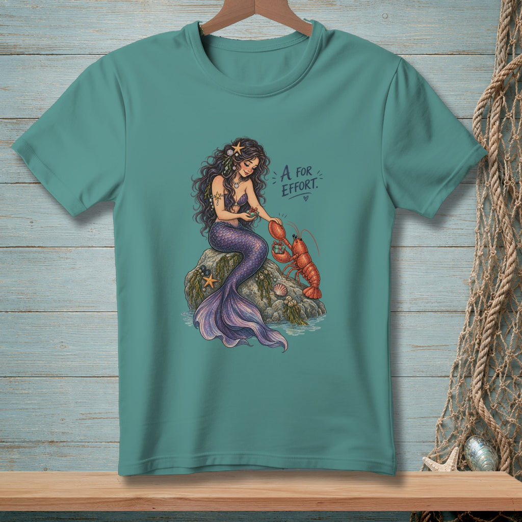 Mermaid interacting with a lobster, with text "A for Effort".