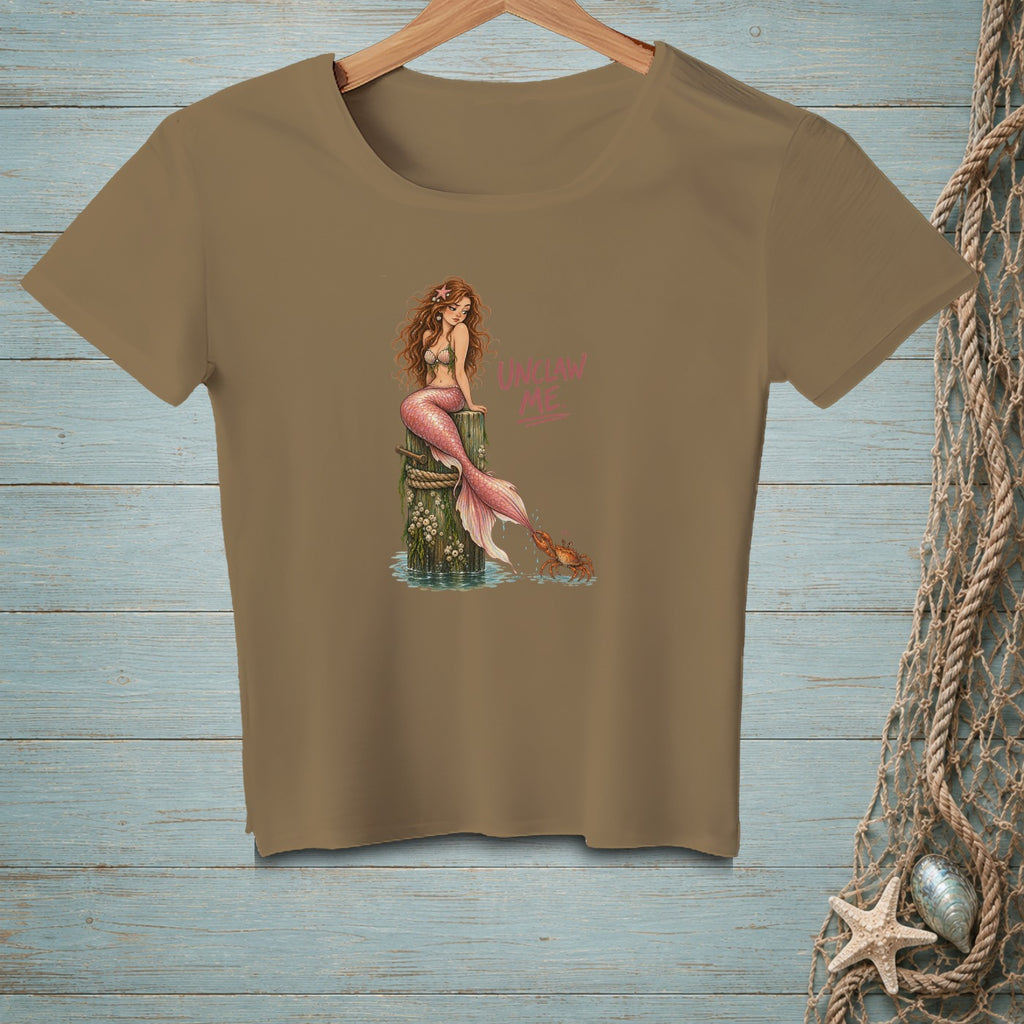 Brown t-shirt with a mermaid sitting on a post and a crab, "Unclaw Me" text.