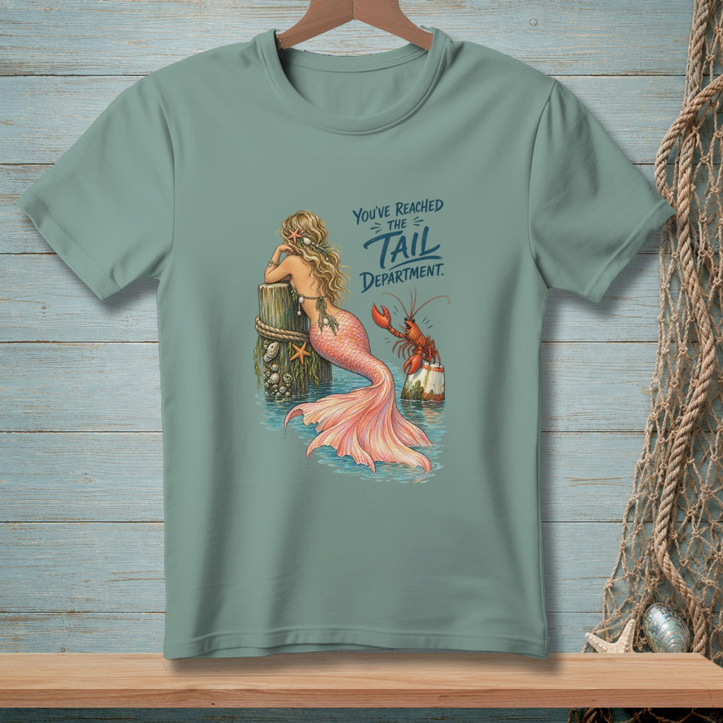 Mermaid with pink tail and lobster near a wooden post. Text reads "You've Reached the Tail Department."