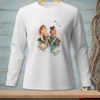 Two mermaids sit on rocks in the water, a seagull flies above.